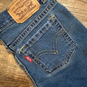 Levi's Blue Denim Boot Cut Jeans with Yellow Stitching